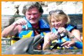 Goldie Hawn Rocks a Red Swimsuit at Age 67, Feeds Dolphins With Kurt Russell